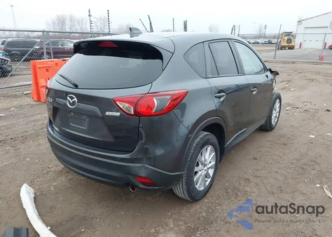 2014 Mazda Cx-5 Touring from USA, damaged, VIN JM3KE2CY6E0403597